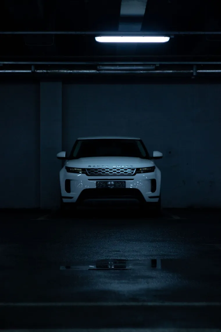 White compact SUV photographed head-on