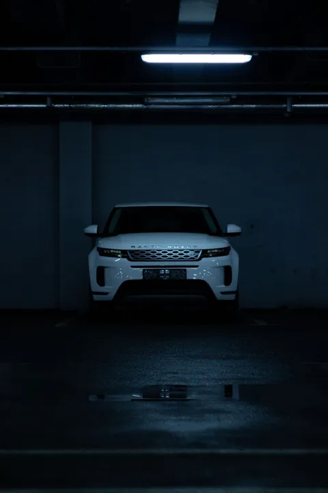 White compact SUV photographed head-on