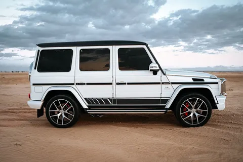 White premium SUV on an open road